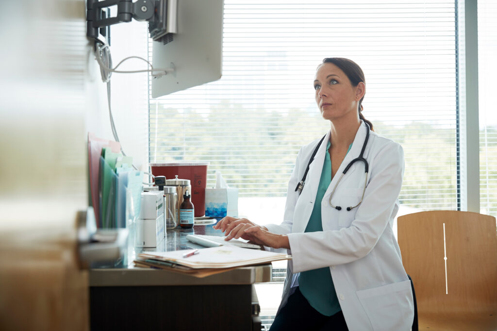 Doctor working on computer